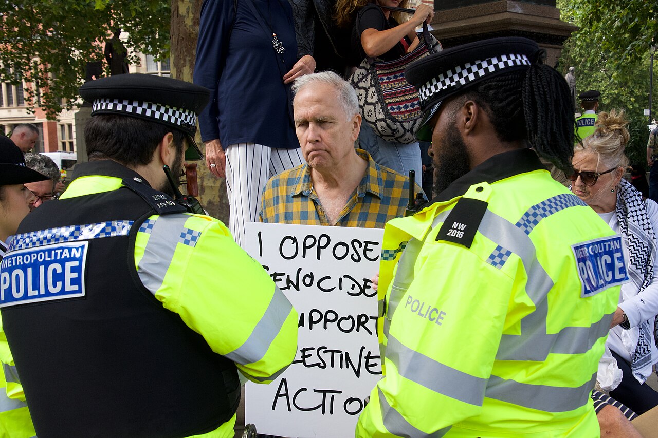 A man being arrested by Met Police in London