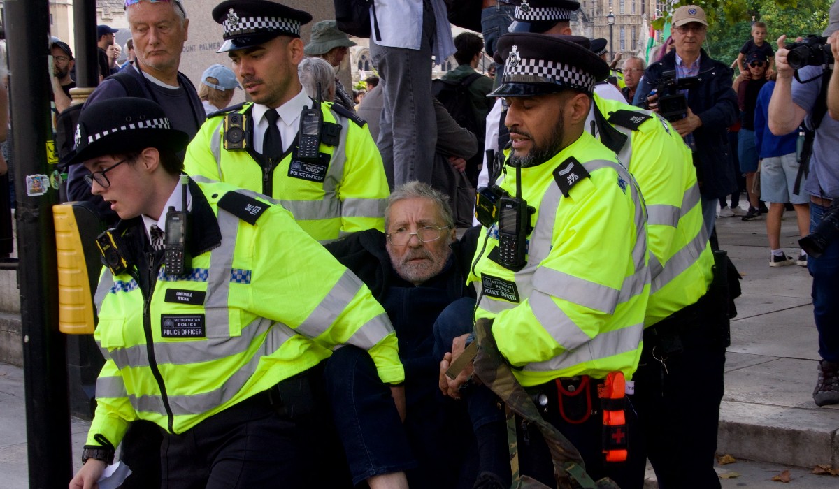 A man being arrested by Met Police in London