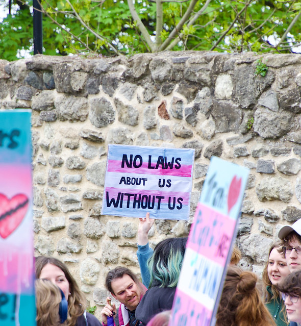 A sign reading no laws about us without us